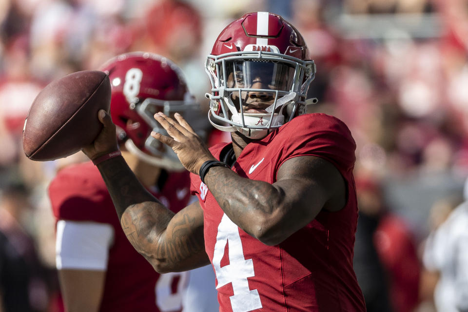 Alabama quarterback Jalen Milroe (4) warms up before an NCAA college football game against Arkansas, Saturday, Oct. 14, 2023, in Tuscaloosa, Ala. (AP Photo/Vasha Hunt)