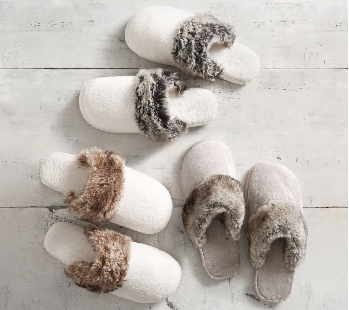 <p><a href="https://go.redirectingat.com?id=74968X1596630&url=https%3A%2F%2Fwww.potterybarn.com%2Fproducts%2Fcozy-fur-slippers%2F%3Fpkey%3Ds%257Ewomens%2Bslippers%257E12&sref=https%3A%2F%2Fwww.countryliving.com%2Fshopping%2Fgifts%2Fg44654436%2Ftop-christmas-gift-ideas%2F" rel="nofollow noopener" target="_blank" data-ylk="slk:Shop Now;elm:context_link;itc:0;sec:content-canvas" class="link rapid-noclick-resp">Shop Now</a></p><p>Faux Fur Slippers </p><p>$31.00</p><span class="copyright">Pottery Barn </span>