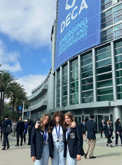 Ann Lord, Kristin Bennett, and Emma Rigg at the DECA International Career Development Conference in Anaheim, California. Photo courtesy of Dr. Shannon Castillo.