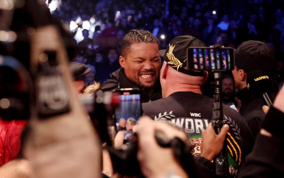 Tyson Fury interacts with Joe Joyce after the WBC World Heavyweight Title fight between Tyson Fury and Derek Chisora at Tottenham Hotspur Stadium on December 03, 2022 in London, England - Warren Little/Getty Images