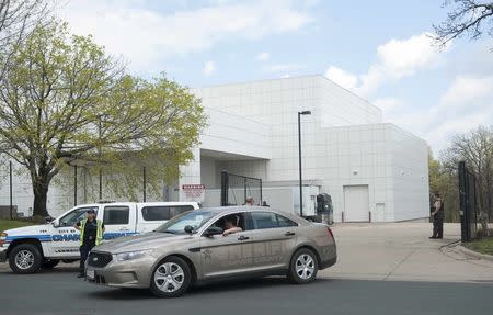 A sheriff's car leaves Paisley Park, U.S. music superstar Prince's estate in Chanhassen, Minnesota April 21, 2016. REUTERS/Craig Lassig/File photo