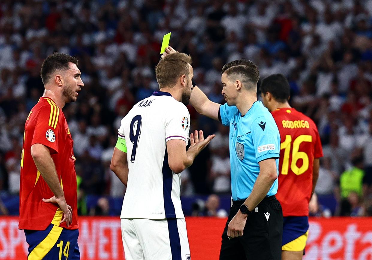 Harry Kane argues his case after a yellow card (EPA)