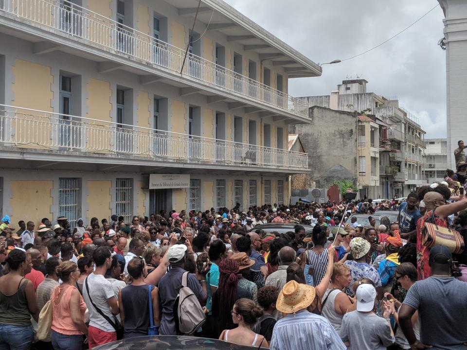 Crowds gather to watch the procession at the Guadeloupean festival