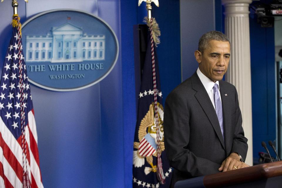 President Barack Obama speaks about the ongoing situation in Ukraine in the Brady Press Briefing Room of the White House in Washington, Friday, Feb. 28, 2014. Obama warned Russia "there will be costs" for any military intervention in Ukraine. (AP Photo/Pablo Martinez Monsivais)