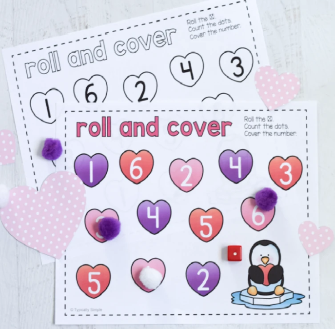<p>This one is great for kids and helps them learn number recognition. Grab a die from any of the other board games you might have laying around and follow the instructions on this adorable printable.</p><p><em><a href="https://typicallysimple.com/roll-cover-hearts/" rel="nofollow noopener" target="_blank" data-ylk="slk:Get the tutorial at Typically Simple »;elm:context_link;itc:0" class="link ">Get the tutorial at Typically Simple »</a></em></p>