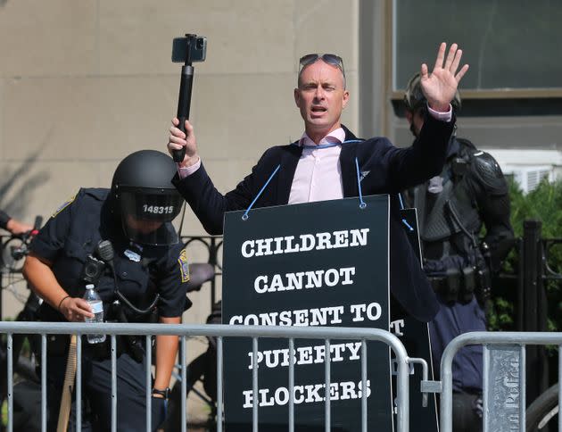 Protester Chris Elston is seen outside of Boston Children's Hospital in September opposing hormone treatment for transgender youth.