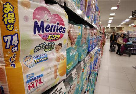 Kao Corp's 'Merries' brand diapers sit on a display shelf at an Aeon Co Ltd's supermarket outlet in Chiba, east of Tokyo, March 31, 2014. REUTERS/Yuya Shino