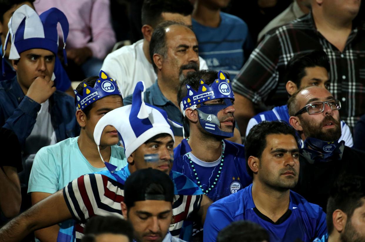 Esteghlal supporters attend the AFC Champions League group C football match between Iran's Esteghlal and Qatar's Al Duhail at the Azadi Stadium in Tehran on May 6, 2019. (Photo by ATTA KENARE / AFP)        (Photo credit should read ATTA KENARE/AFP/Getty Images)