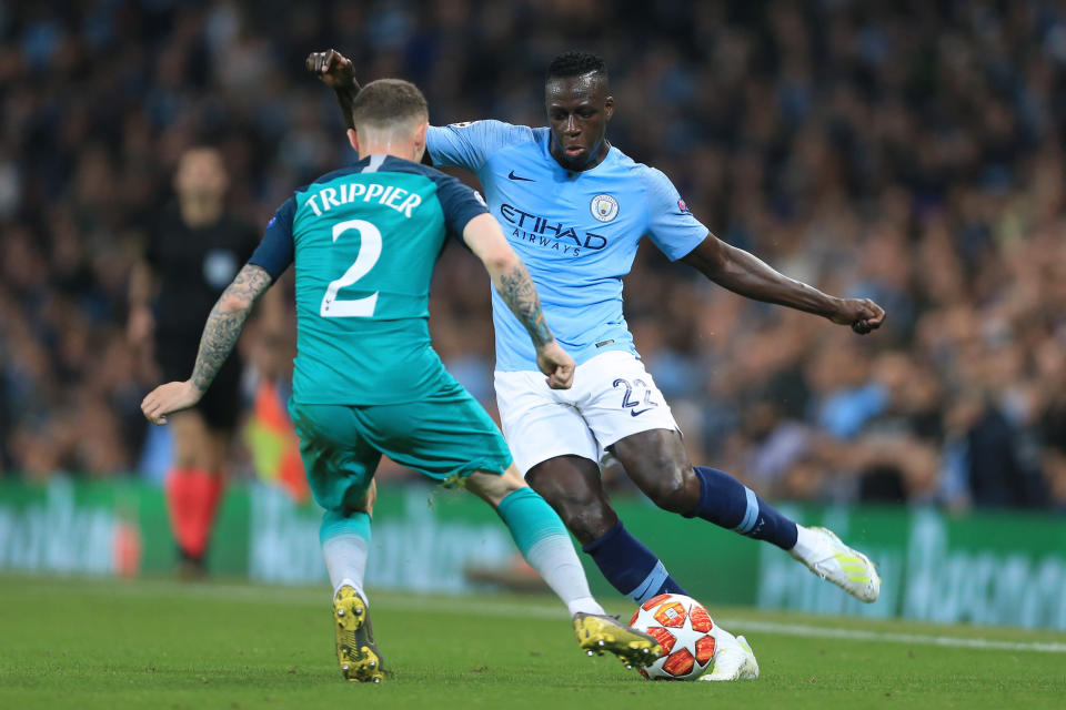 MANCHESTER, ENGLAND - APRIL 17: Benjamin Mendy of Man City battles with Kieran Trippier of Spurs during the UEFA Champions League Quarter Final second leg match between Manchester City and Tottenham Hotspur at the Etihad Stadium on April 17, 2019 in Manchester, England. (Photo by Simon Stacpoole/Offside/Getty Images)