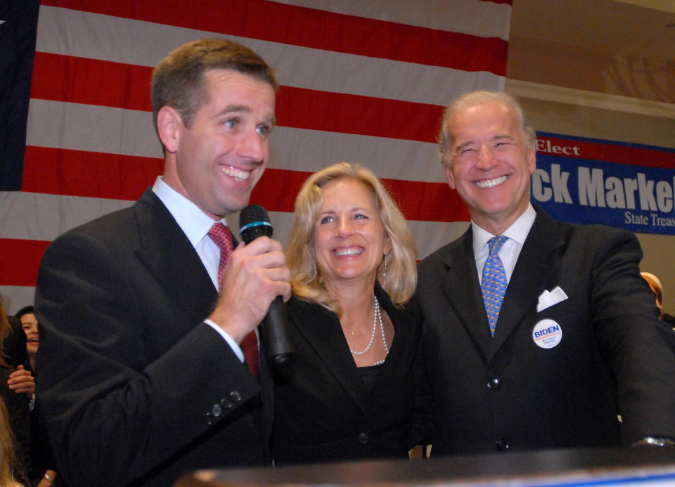 FILE - Democrat Beau Biden, who was elected state attorney general, is joined by his parents, Jill Biden and Sen. Joe Biden, D-Del., during his victory celebration in Wilmington, Del., Tuesday, Nov. 7, 2006. “Jill: A Biography of the First Lady,” by Associated Press journalists Julie Pace and Darlene Superville, details the life of Jill Biden. Superville covers the White House for the AP; Pace, a former White House correspondent and Washington bureau chief, is now AP’s executive editor. (AP Photo/Pat Crowe II, File)