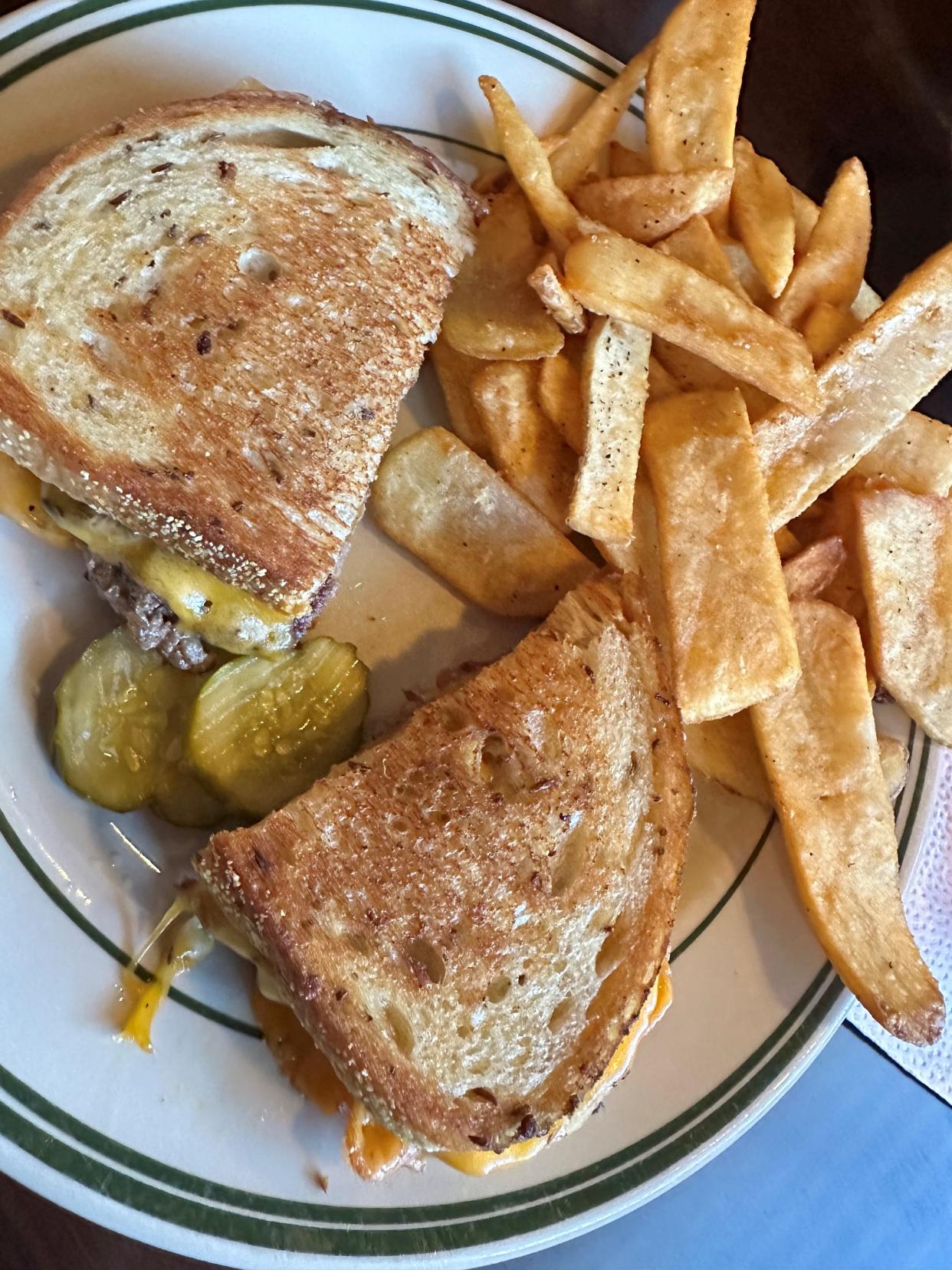 A perfectly toasted, meaty and melty patty melt, served with tavern steak fry chips, is a delight at Miller-Doan Tavern in Canal Fulton.