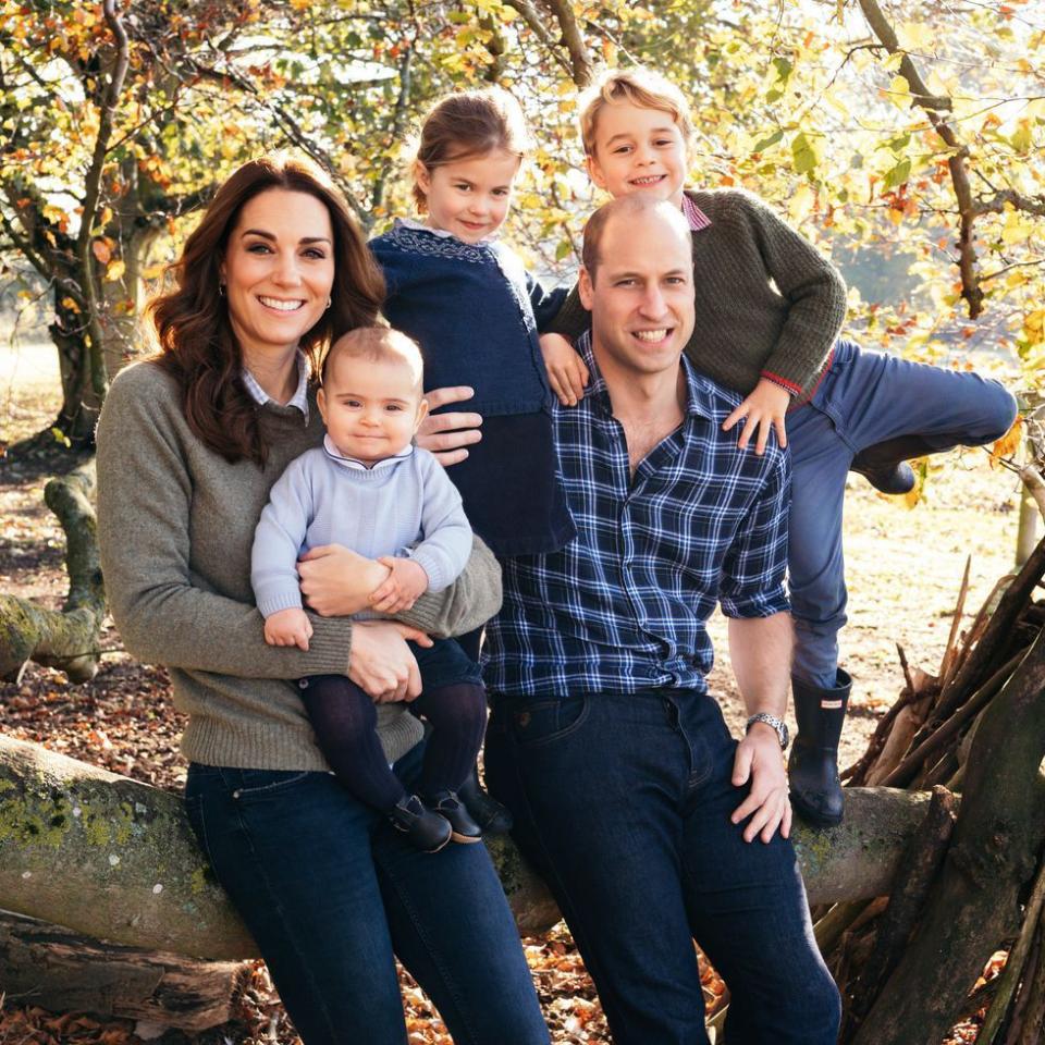 <p>Charlotte gives the camera a cheeky grin in her family's newly released 2018 Christmas Card. The princess's darling blue jumper and skirt match her father Prince William and baby brother Prince Louis' outfits, too!</p>