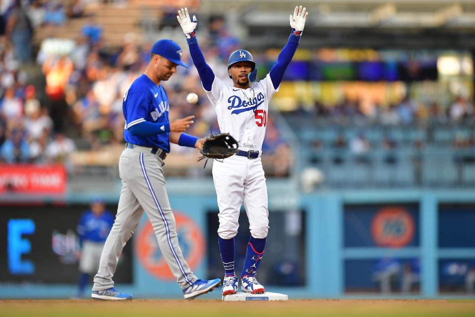 Mookie Betts reacts after a double against the Blue Jays at Dodger Stadium.