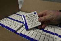 Boxes of Sputnik V vaccines at a warehouse of Hungaropharma, a Hungarian pharmaceutical wholesale company, in Budapest, Hungary, Thursday, March 4, 2021, after a shipment of 280,000 doses of the Russian vaccine Sputnik V arrived in Hungary. (Zoltan Mathe/MTI via AP)