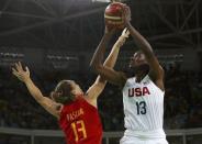 2016 Rio Olympics - Basketball - Final - Women's Gold Medal Game USA v Spain - Carioca Arena 1 - Rio de Janeiro, Brazil - 20/8/2016. Sylvia Fowles (USA) of USA shoots over Lucila Pascua (ESP) of Spain. REUTERS/Jim Young