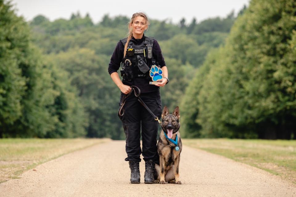 Police dog handler Pc Megan West and German shepherd Calli (Penny Bird/Thin Blue Paw Awards/PA) (PA Media)