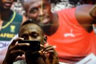 Jamaican sprinter Usain Bolt takes a picture during a news conference before the Ostrava Golden Spike athletics meeting in Ostrava, Czech Republic, June 26, 2017. REUTERS/David W Cerny