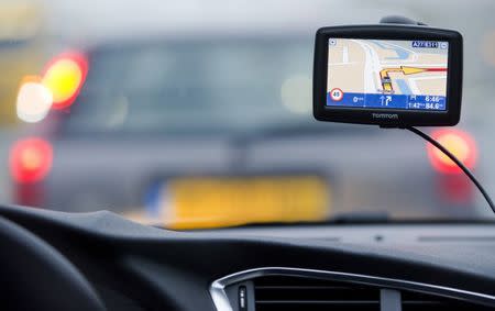 A TomTom navigation device is seen in this photo illustration taken in Amsterdam February 28, 2012. REUTERS/Robin van Lonkhuysen/United Photos