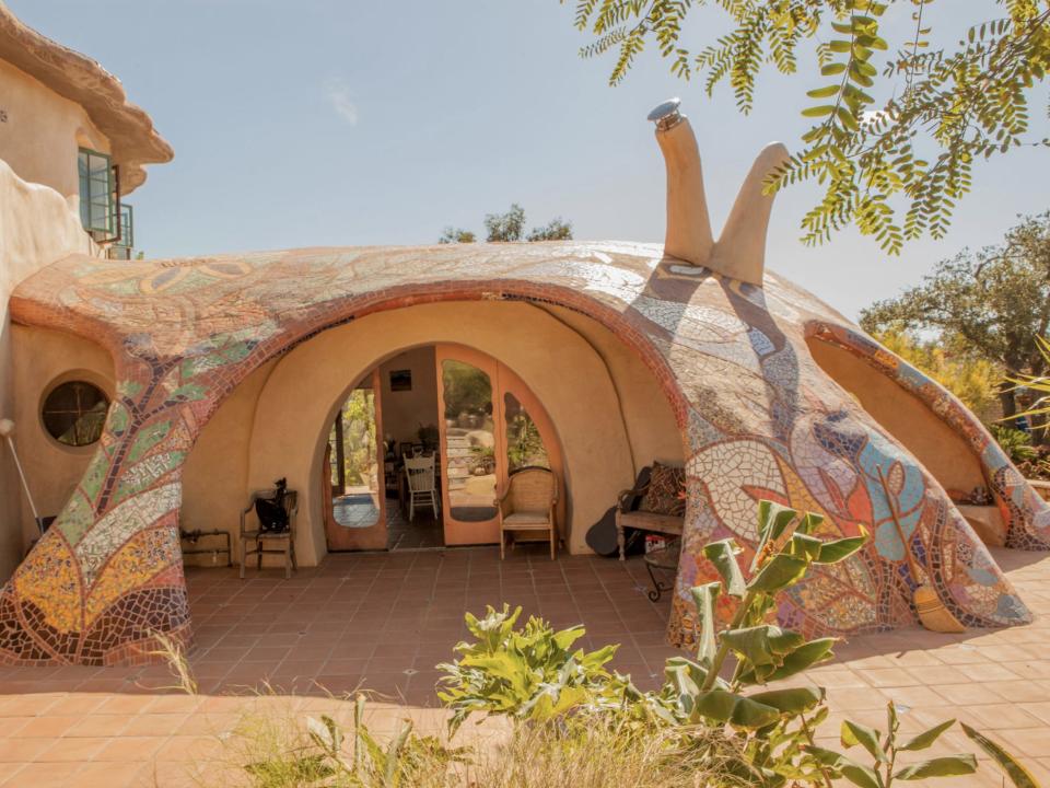 A curved home with two pipes popping out like a snail.