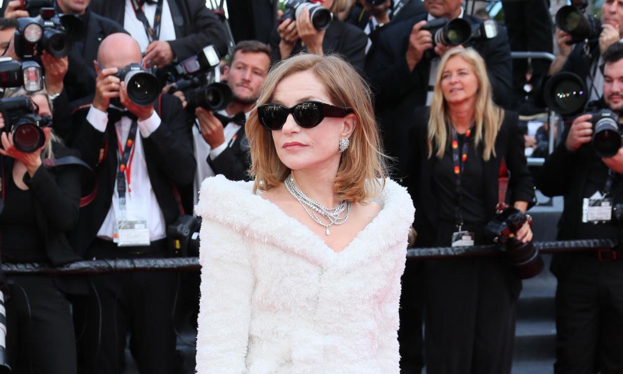 <span>Isabelle Huppert at the Cannes film festival in May. A bathrobe is ‘basically a wrap dress’, says one fashion writer.</span><span>Photograph: JB Lacroix/FilmMagic</span>