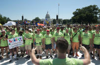 <p>GALA Chorus members from around the country sing on the National Mall with Capitol Hill in the background during the Equality March for Unity and Pride in Washington, Sunday, June 11, 2017. (Photo: Carolyn Kaster/AP) </p>