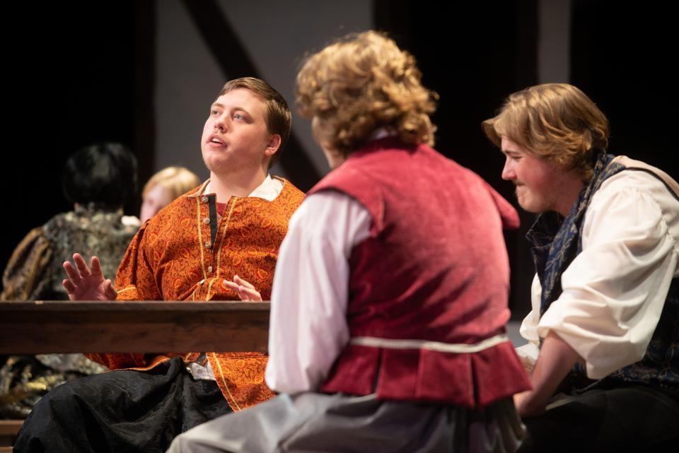 Washburn Rural actors Jaq Donaldson, Casey Schenk and Aidan Kent portray friends of William Shakespeare in the play "The Book of Will" during a dress rehearsal for their performance at the upcoming International Thespian Festival.