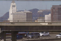 Motorists wait on a highway ramp in heavy traffic after a fire on Interstate 10, Tuesday, Nov. 14, 2023, in Los Angeles. California Gov. Gavin Newsom says a stretch of Interstate 10 in Los Angeles that was burned in an act of arson does not need to be demolished, and that repairs will take an estimated three to five weeks. Newsom announced the finding Tuesday, based on analysis of core samples taken from the freeway, a vital artery used by 300,000 vehicles daily. (AP Photo/Damian Dovarganes)