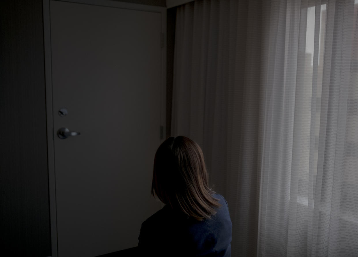 2/25/20, Gaithersburg, Md. Emma, a human trafficking survivor from China, in a hotel room in Gaithersburg, Md. on Feb. 25, 2020. Gabriella Demczuk / TIME
