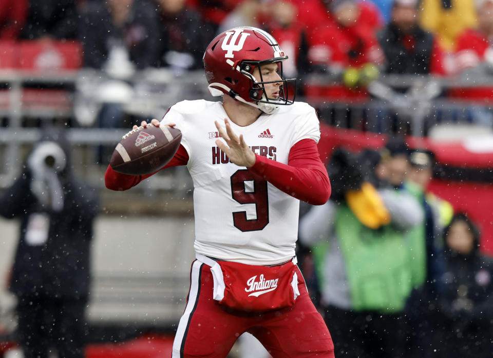 Indiana quarterback Connor Bazelak drops back to pass against Ohio State during the first half of an NCAA college football game Saturday, Nov. 12, 2022 in Columbus, Ohio. (AP Photo/Paul Vernon)