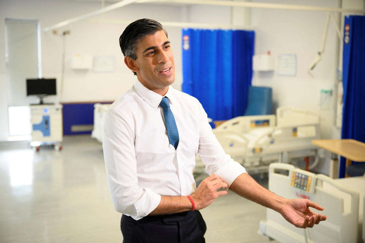 British Prime Minister Rishi Sunak speaks with members of the media as he visits Croydon University Hospital on October 28, 2022 in London, Britain. Leon Neal/Pool via REUTERS