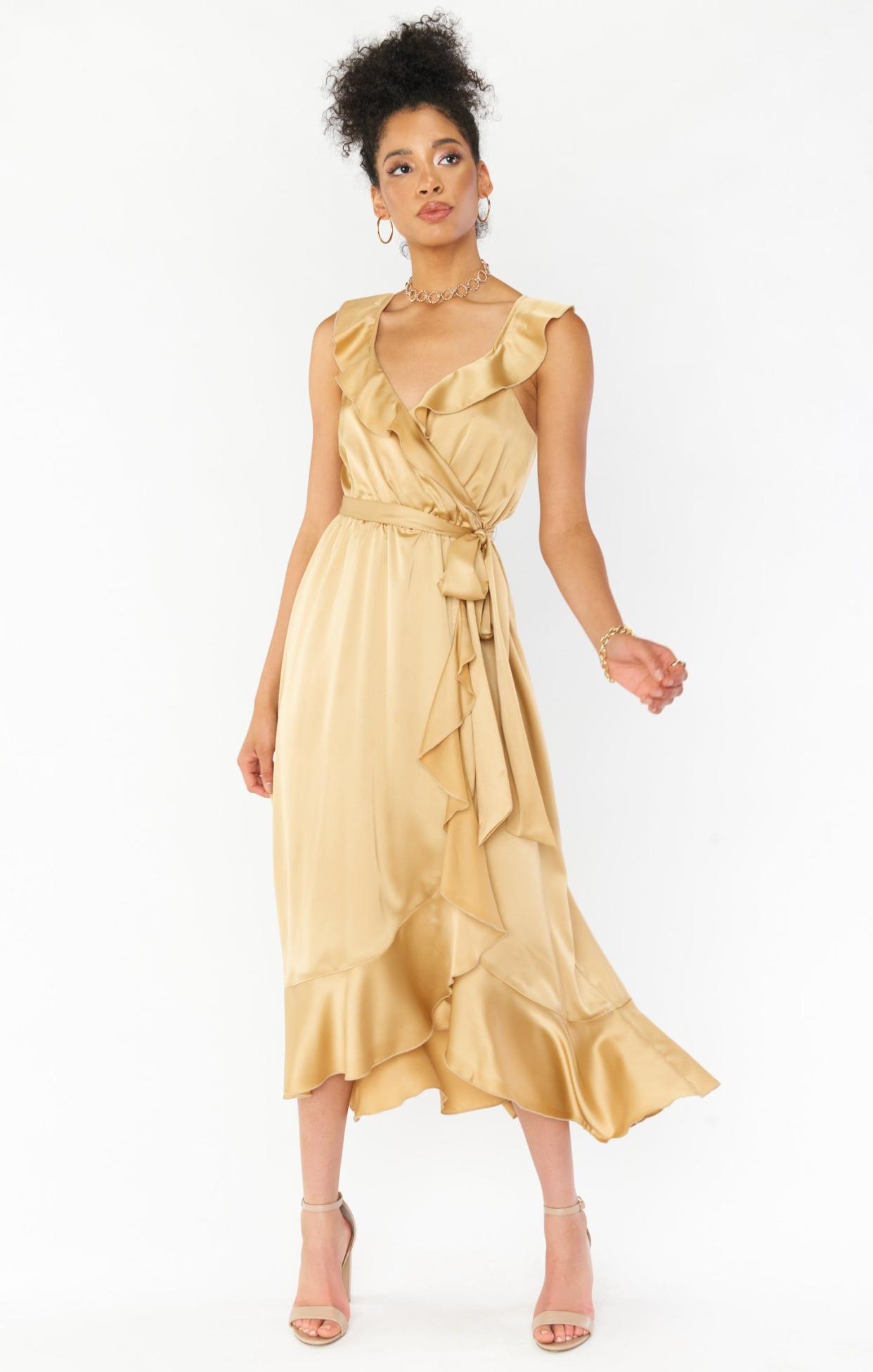 <p><a href="https://go.redirectingat.com?id=74968X1596630&url=https%3A%2F%2Fshowmeyourmumu.com%2Fproducts%2Fsamantha-ruffle-wrap-dress-true-gold-luxe-satin&sref=https%3A%2F%2Fwww.townandcountrymag.com%2Fstyle%2Ffashion-trends%2Fg44319781%2Fand-just-like-that-season-2-outfits%2F" rel="nofollow noopener" target="_blank" data-ylk="slk:Shop Now;elm:context_link;itc:0;sec:content-canvas" class="link rapid-noclick-resp">Shop Now</a></p><p>Samantha Ruffle Wrap Dress</p><p>$148.00</p><p>showmeyourmumu.com</p>