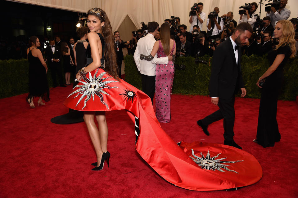 Zendaya in a voluminous red gown with spider embellishment at the Met Gala