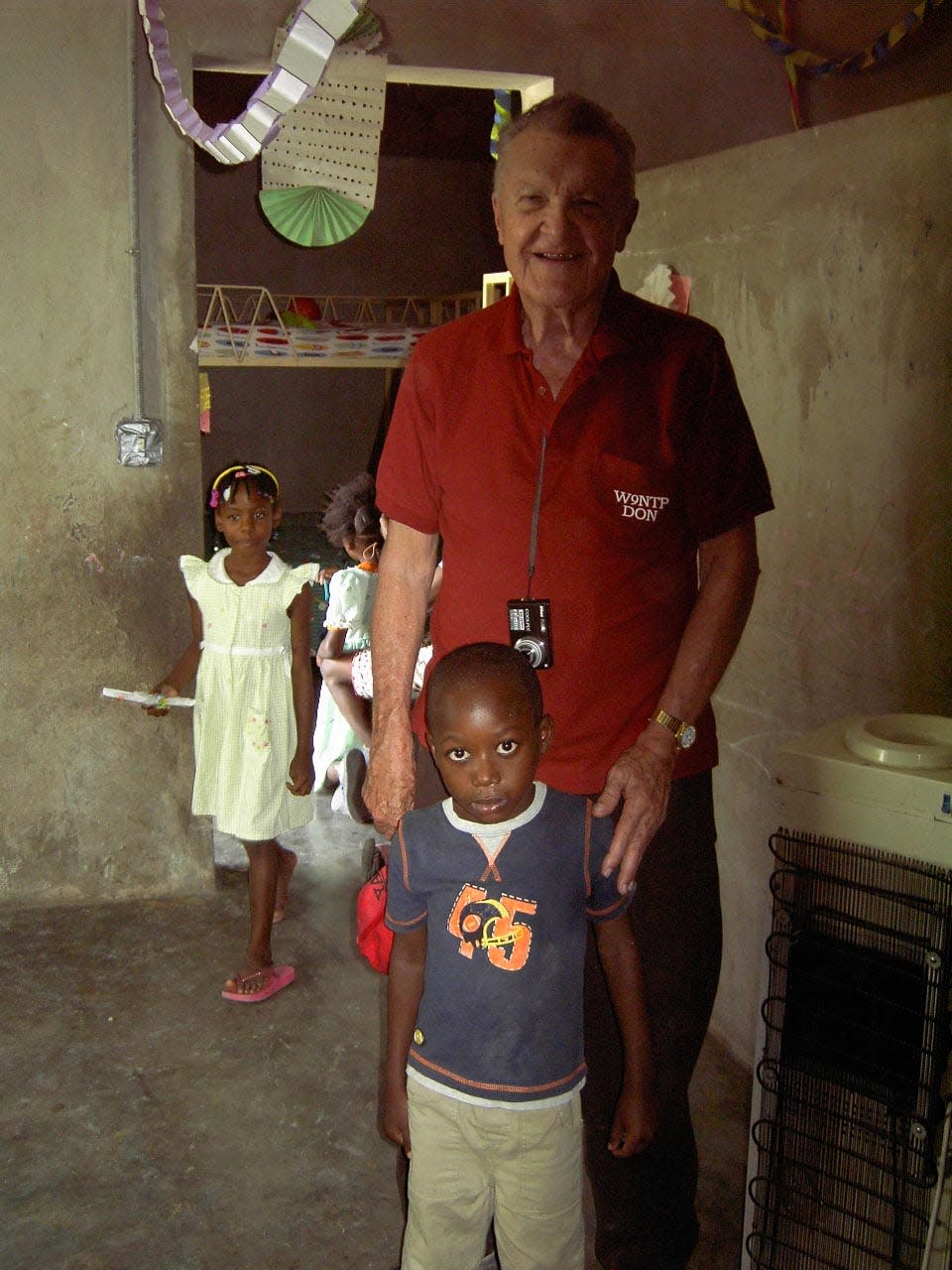 Don Miller was at an orphanage in Fedja, Haiti, in this undated photo. His church, Moscow Christian Church in Moscow, Indiana, helped to sponsor a missionary effort in Haiti that supported the construction of churches that are also used as schools and helped sponsor the orphanage.