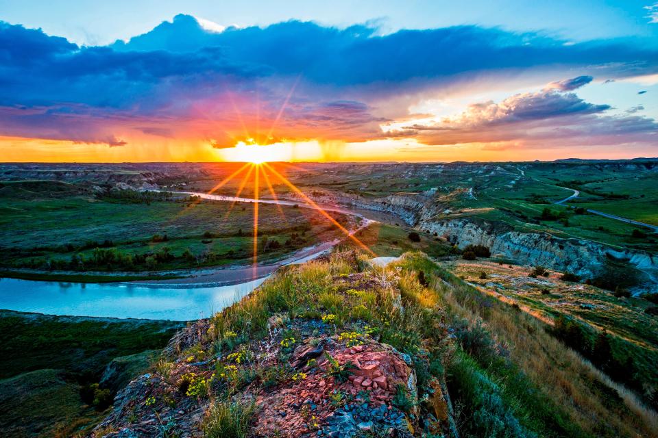 Sunset basks Theodore Roosevelt National Park's South Unit in brilliant color near Wind Canyon Trail.