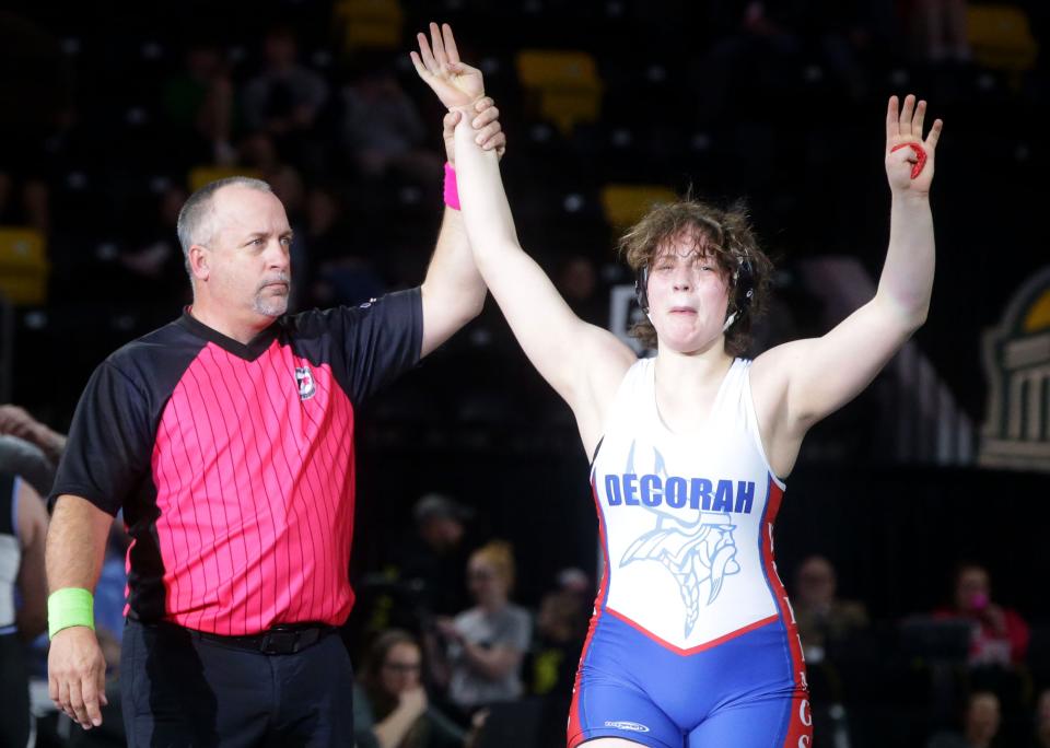 Decorah's Naomi Simon celebrates after winning the 170-pound championship at the IGHSAU girls state wrestling tournament Friday, Feb. 2, 2024 at Xtream Arena in Coralville.