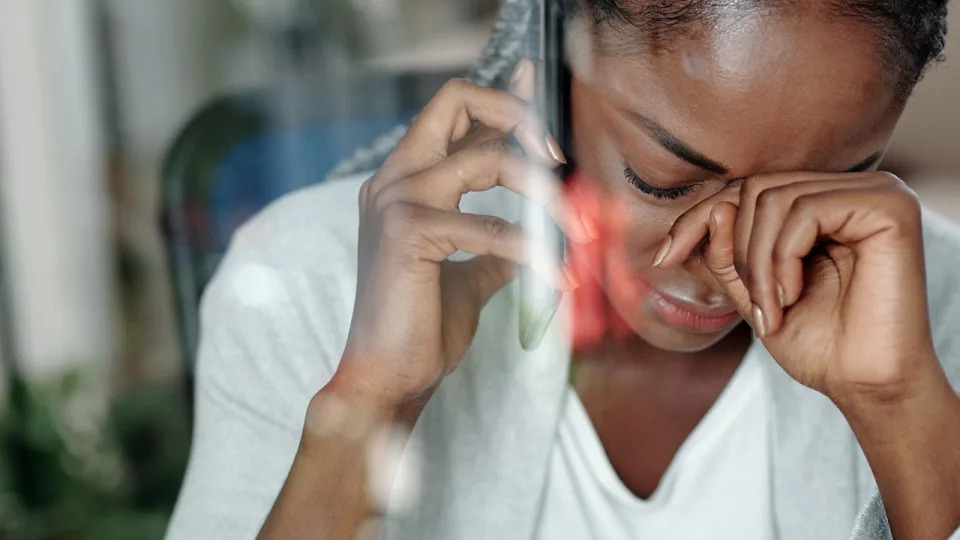 Depressed woman on phone