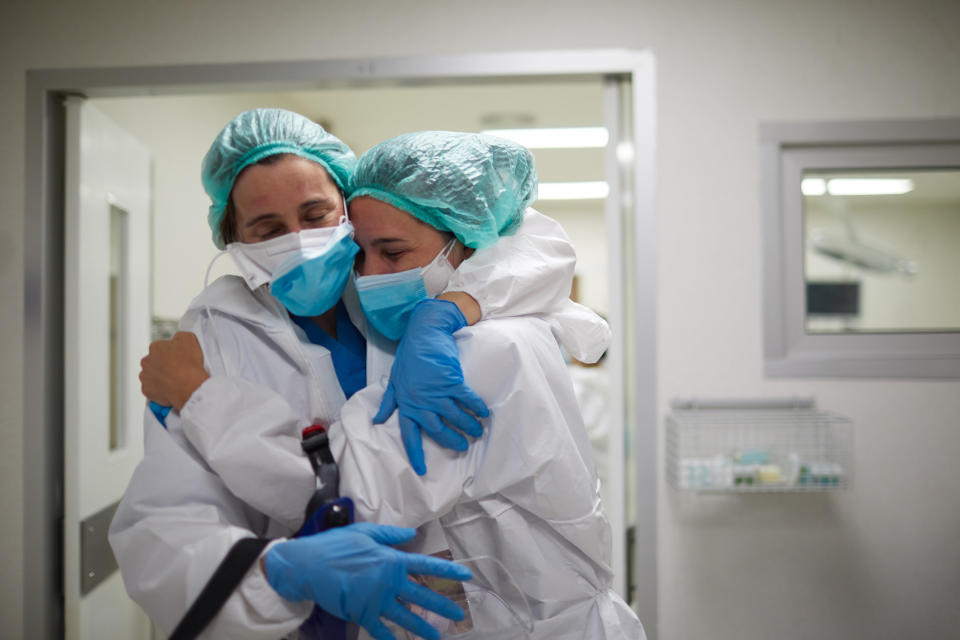 two doctors hugging