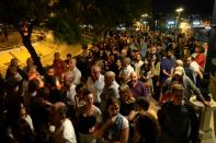 Thousands of people gather for a candlelight vigil in Sliema, on October 16, 2017, in tribute to late journalist Daphne Caruana Galizia who was killed by a car bomb close to her home in Bidnija, Malta