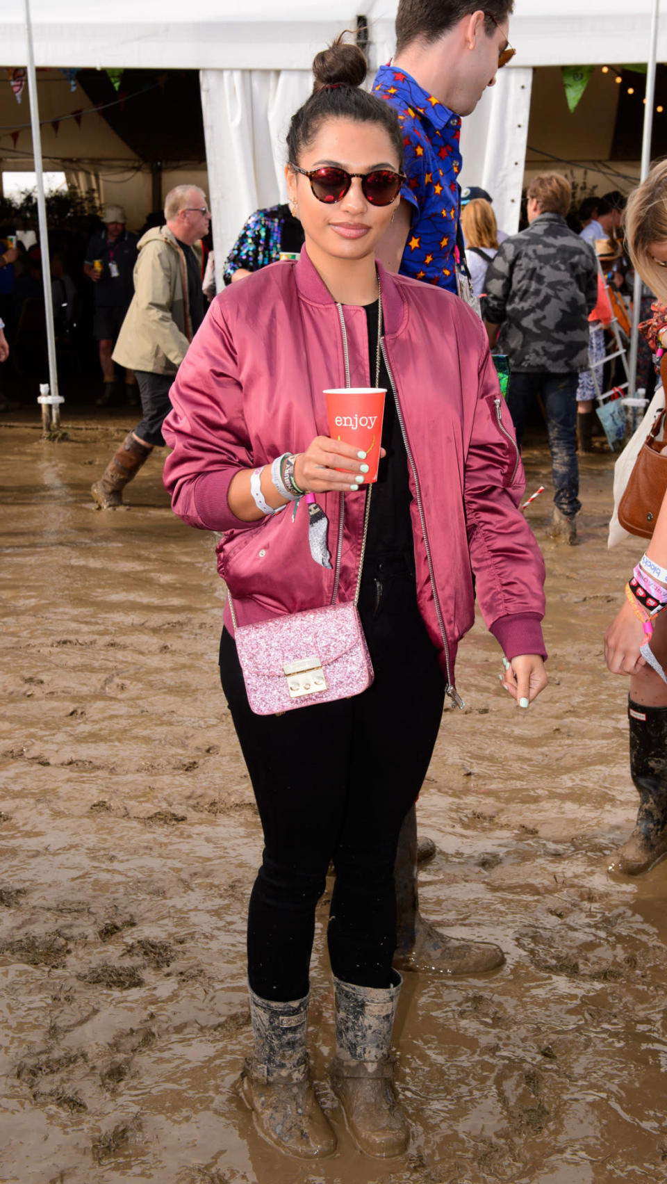 The Saturdays singer Vanessa White donned a satin bomber jacket for the festival. 