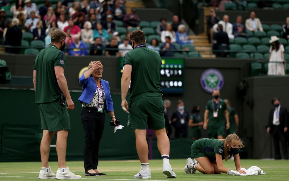 Denise Parnell directs ground staff to dry Court 1 - Denise Parnell to become first female referee as Wimbledon's women's takeover continues - PA/Steven Paston