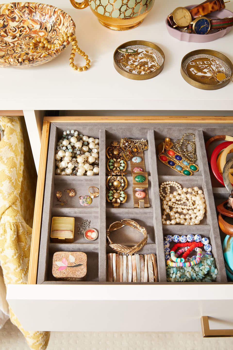 a drawer with jewelry