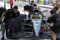 Mercedes driver Lewis Hamilton of Britain makes a pit stop during the third practice session of the Formula One Miami Grand Prix auto race, at Miami International Autodrome in Miami Gardens, Fla., Saturday, May 6, 2023. (AP Photo/Rebecca Blackwell)