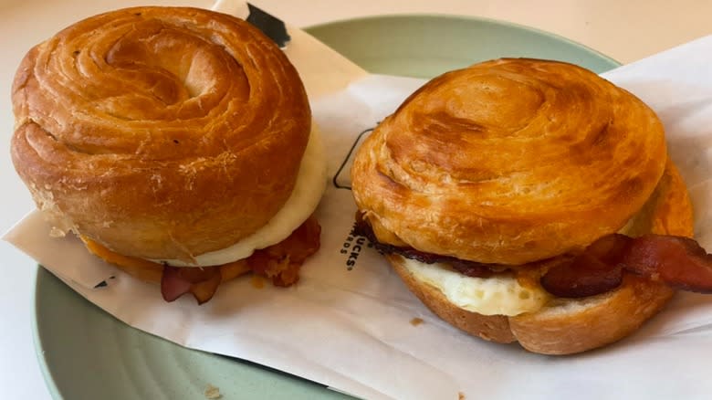 two breakfast sandwiches