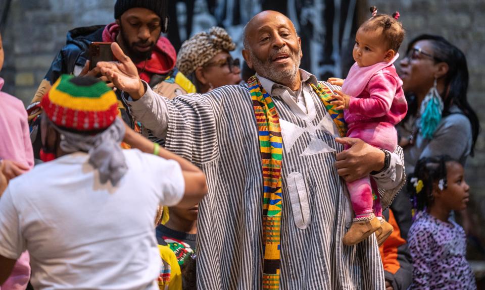 Clayborn Benson takes part in the introduces children to the audience during a Kwanzaa celebration Monday, December 26, 2022 at the Wisconsin Black Historical Society, 2620 W. Center St. in Milwaukee, Wis. Kwanzaa, a weeklong cultural celebration honoring African American culture and African heritage, begins on December 26 and ends January 1. The holiday occurs over the same seven days each year. Kwanzaa was created in 1966 by Maulana Karenga, a professor of Africana studies at California State University in Long Beach  The celebration of Kwanzaa is about embracing 7 ethical principles including unity, self-determination, collective work and responsibility, cooperative economics, purpose, creativity and faith.