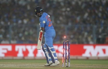 Cricket - India v Pakistan- World Twenty20 cricket tournament - Kolkata, India, 19/03/2016. India's Shikhar Dhawan is bowled by Pakistan's Mohammad Sami. REUTERS/Rupak De Chowdhuri