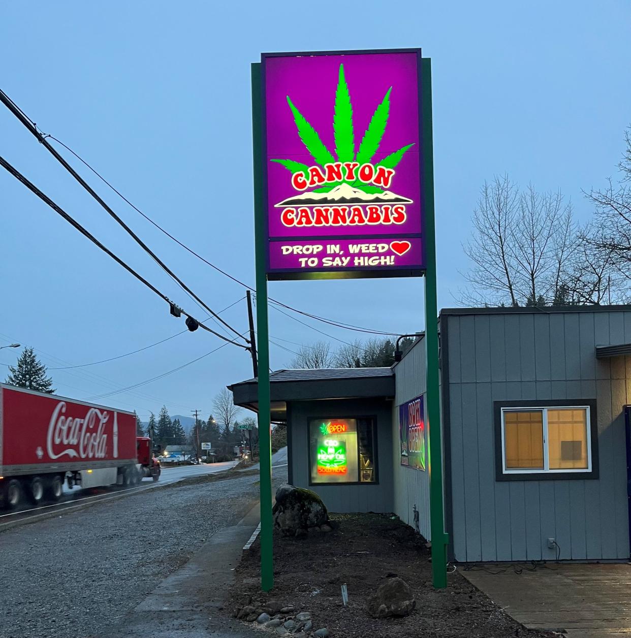 The sign at Canyon Cannabis in Mill City was purchased with funds from the Santiam Canyon Wildfire Relief Fund. The owner said he was unable to access state or federal recovery funds because of the nature of its business.