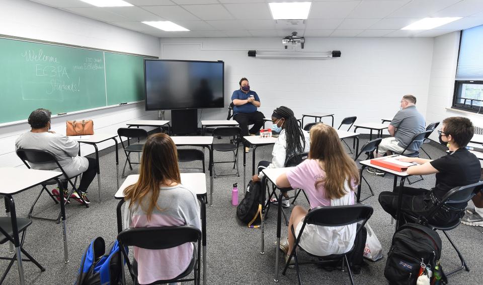 Alex Wheaton, center, teaches an English Composition class on Sept. 1, 2021 at the new Erie County Community College located inside the St. Benedict Education Center in Erie.