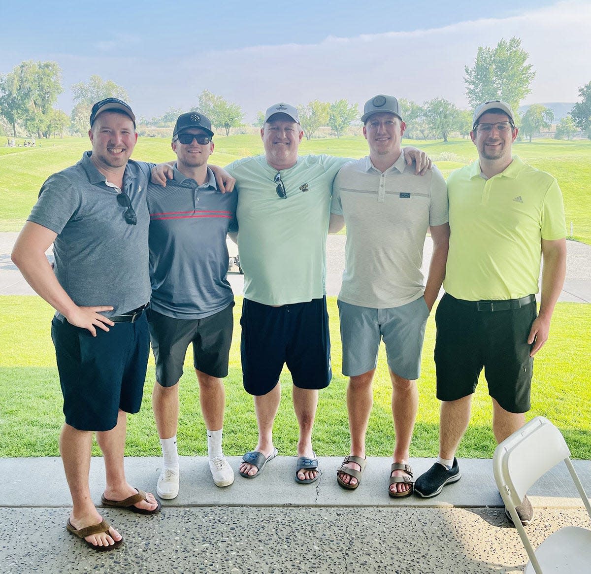 Brad Salley and his four sons, Brandon, Cameron, Ethan and Mason. Once a promising golfer, Brad and wife Karen dedicated themselves to raising a family but still play for fun.