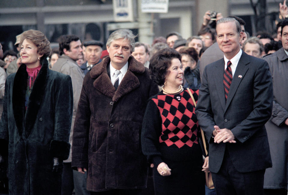 In this Feb. 7, 1990, file photo, U.S. Ambassador to Czechoslovakia Shirley Temple Black, second from right, talks to U.S. Secretary of State James Baker during a ceremony at the Wenceslas Square in Prague, in memory of Czech student Jan Palach who self-immolated in protest against the Soviet invasion. Temple, who died at her home near San Francisco, Monday, Feb. 10, 2014, at 85, sang, danced, sobbed and grinned her way into the hearts of Depression-era moviegoers and remains the ultimate child star decades later. (AP Photo/Pavel Horeisi, File)