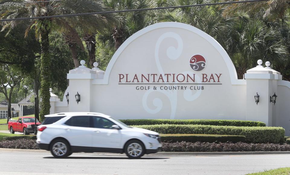 A car on Marco Polo Boulevard rolls past one of the entrances to Plantation Bay in Ormand Beach, Florida, on Wednesday July 1, 2020.